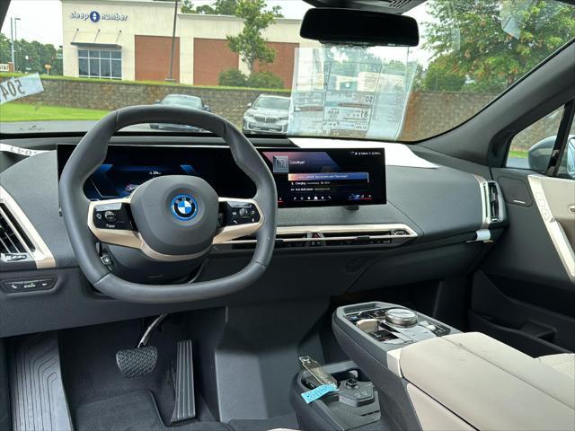 new 2025 BMW iX car, priced at $94,275