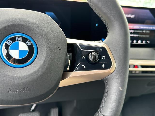 new 2025 BMW iX car, priced at $94,275