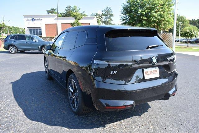 new 2025 BMW iX car, priced at $98,070