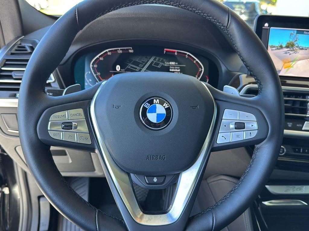 used 2025 BMW X4 car, priced at $49,900