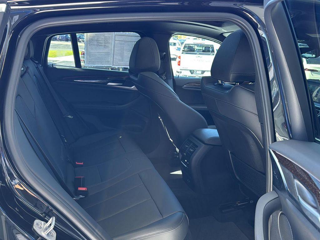 used 2025 BMW X4 car, priced at $49,900