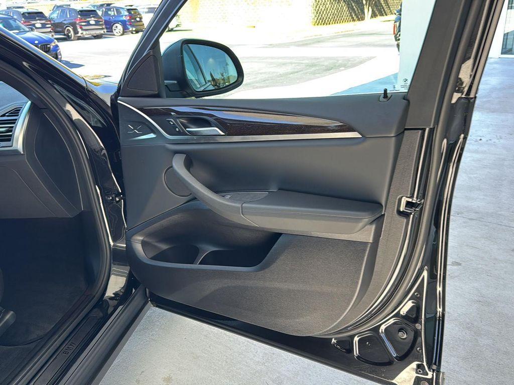 used 2025 BMW X4 car, priced at $49,900