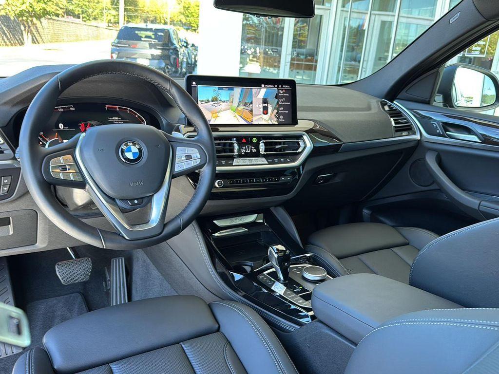 used 2025 BMW X4 car, priced at $49,900