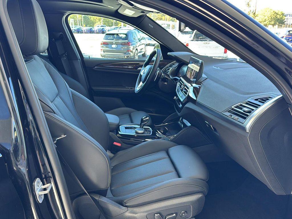 used 2025 BMW X4 car, priced at $49,900