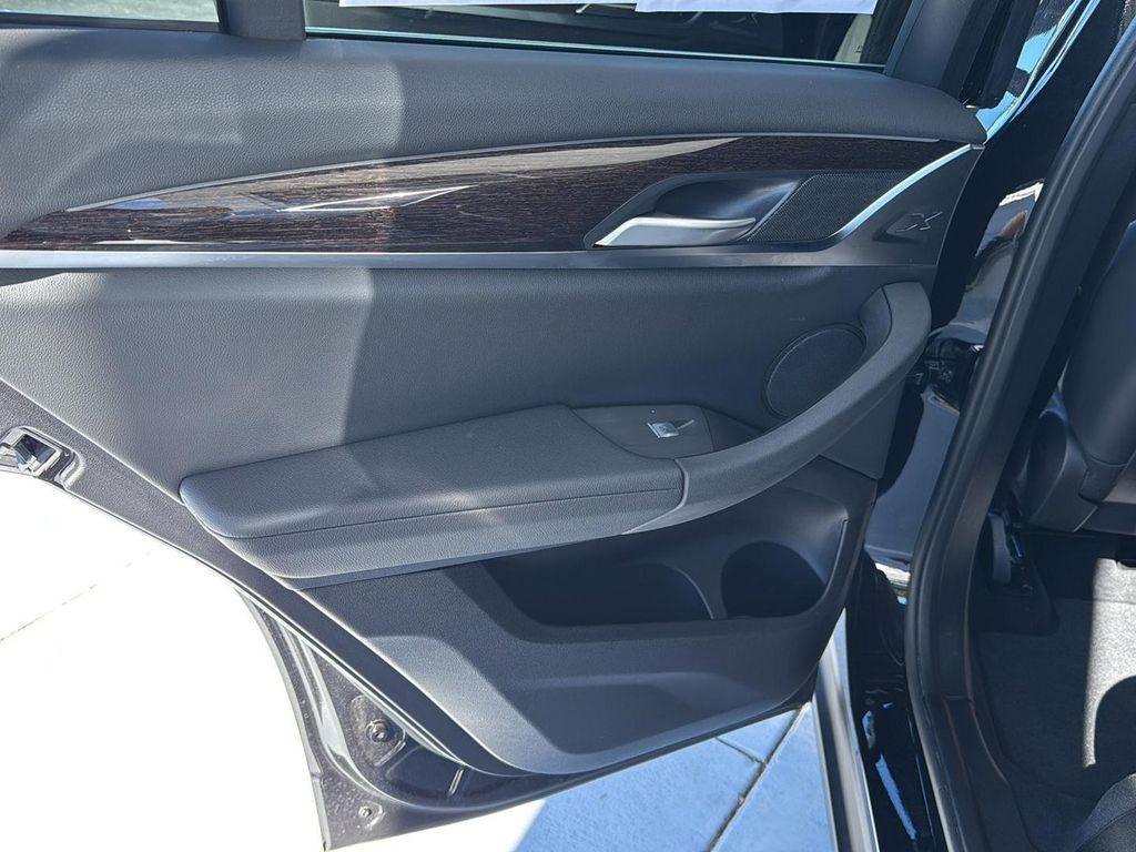 used 2025 BMW X4 car, priced at $49,900