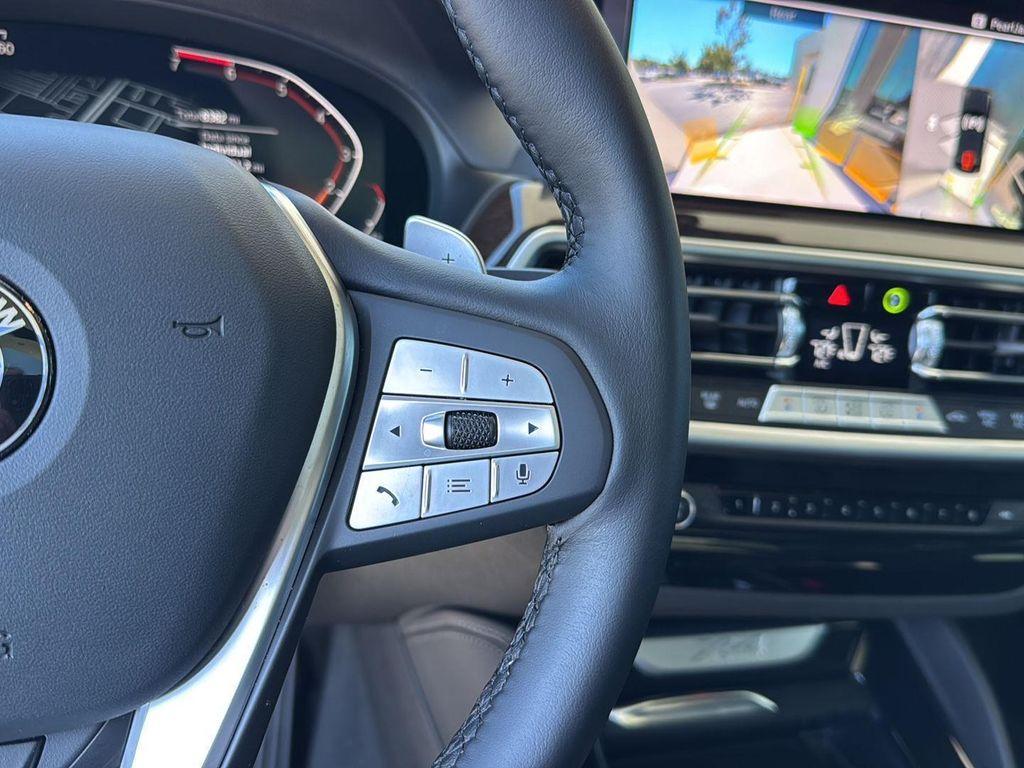 used 2025 BMW X4 car, priced at $49,900