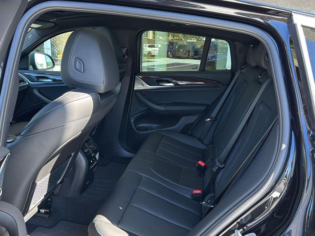 used 2025 BMW X4 car, priced at $49,900