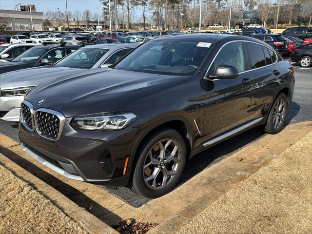 used 2024 BMW X4 car, priced at $52,900