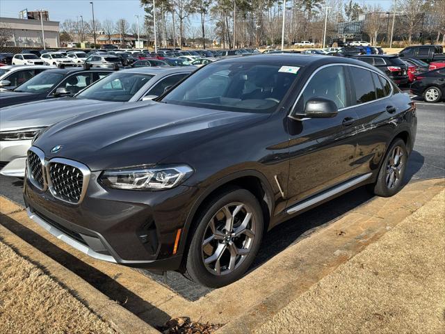 used 2024 BMW X4 car, priced at $52,900