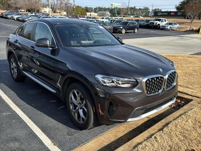 used 2024 BMW X4 car, priced at $52,900