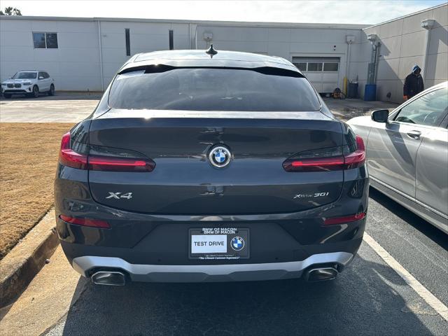 used 2024 BMW X4 car, priced at $52,900