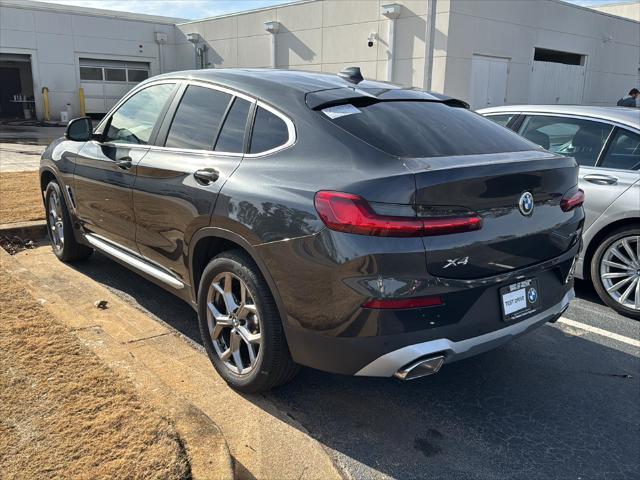 used 2024 BMW X4 car, priced at $52,900