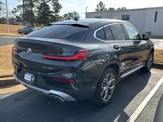 used 2024 BMW X4 car, priced at $52,900