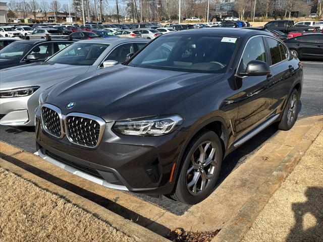 used 2024 BMW X4 car, priced at $52,900