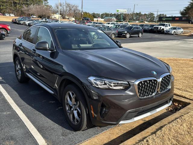 used 2024 BMW X4 car, priced at $52,900