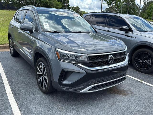 used 2023 Volkswagen Taos car, priced at $25,000