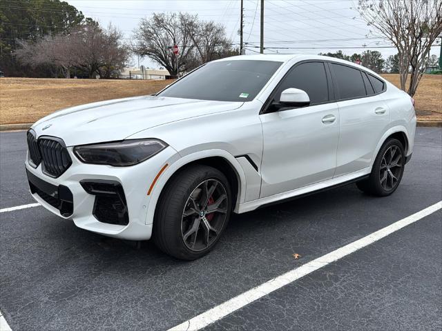 used 2022 BMW X6 car, priced at $55,370