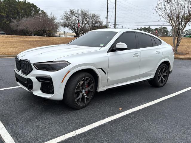 used 2022 BMW X6 car, priced at $55,370