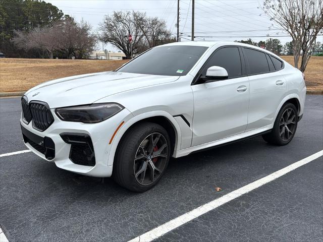 used 2022 BMW X6 car, priced at $55,370