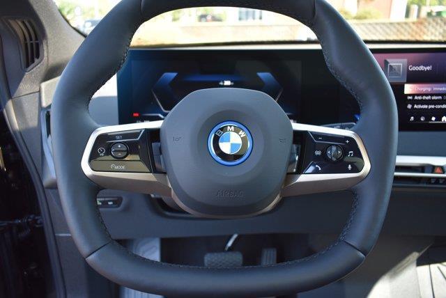 new 2025 BMW iX car, priced at $98,070