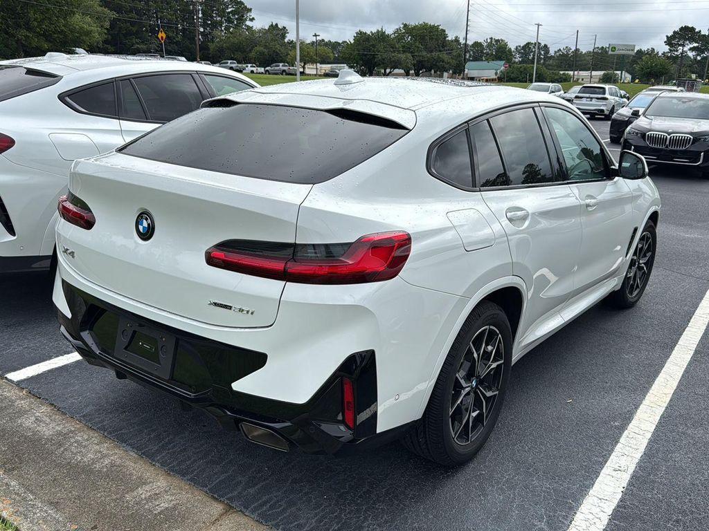 used 2025 BMW X4 car, priced at $54,900