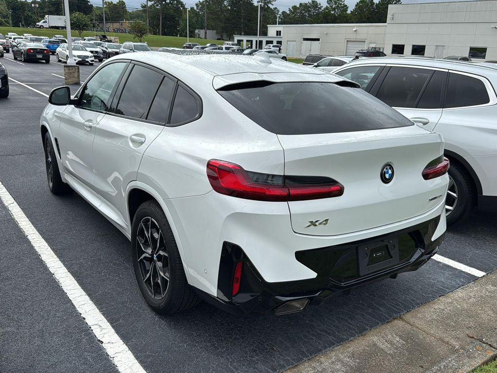 used 2025 BMW X4 car, priced at $54,900