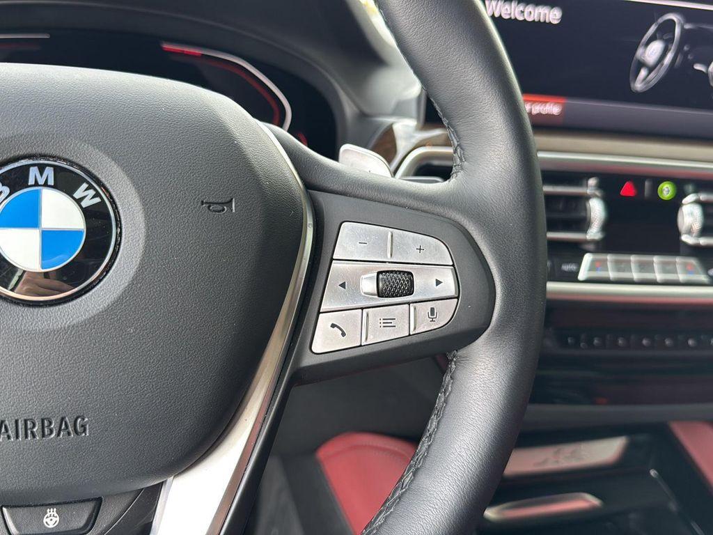 used 2025 BMW X4 car, priced at $51,900