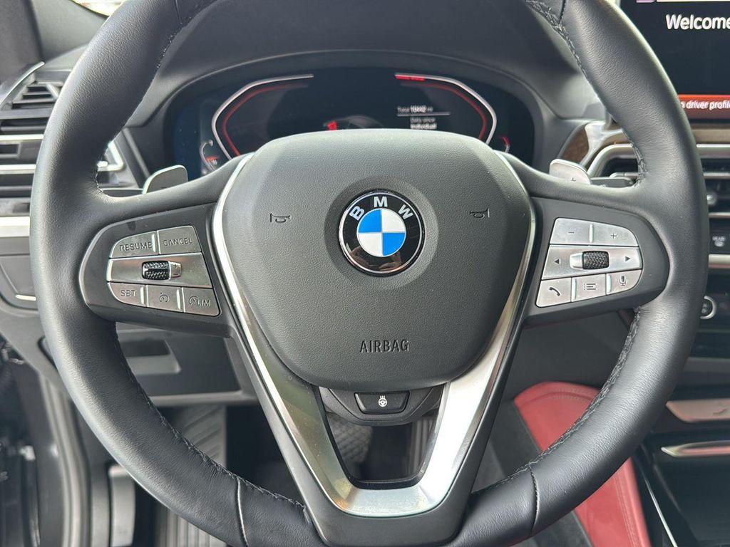 used 2025 BMW X4 car, priced at $51,900