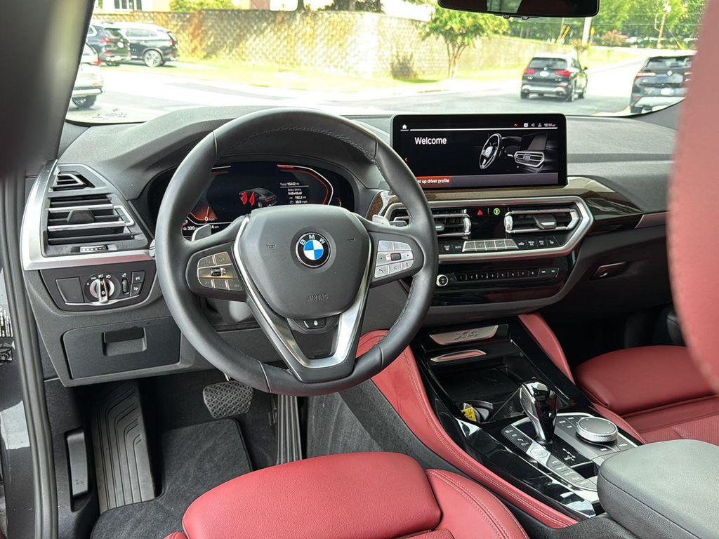 used 2025 BMW X4 car, priced at $51,900