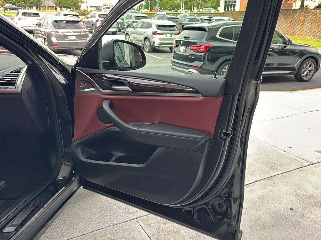 used 2025 BMW X4 car, priced at $51,900