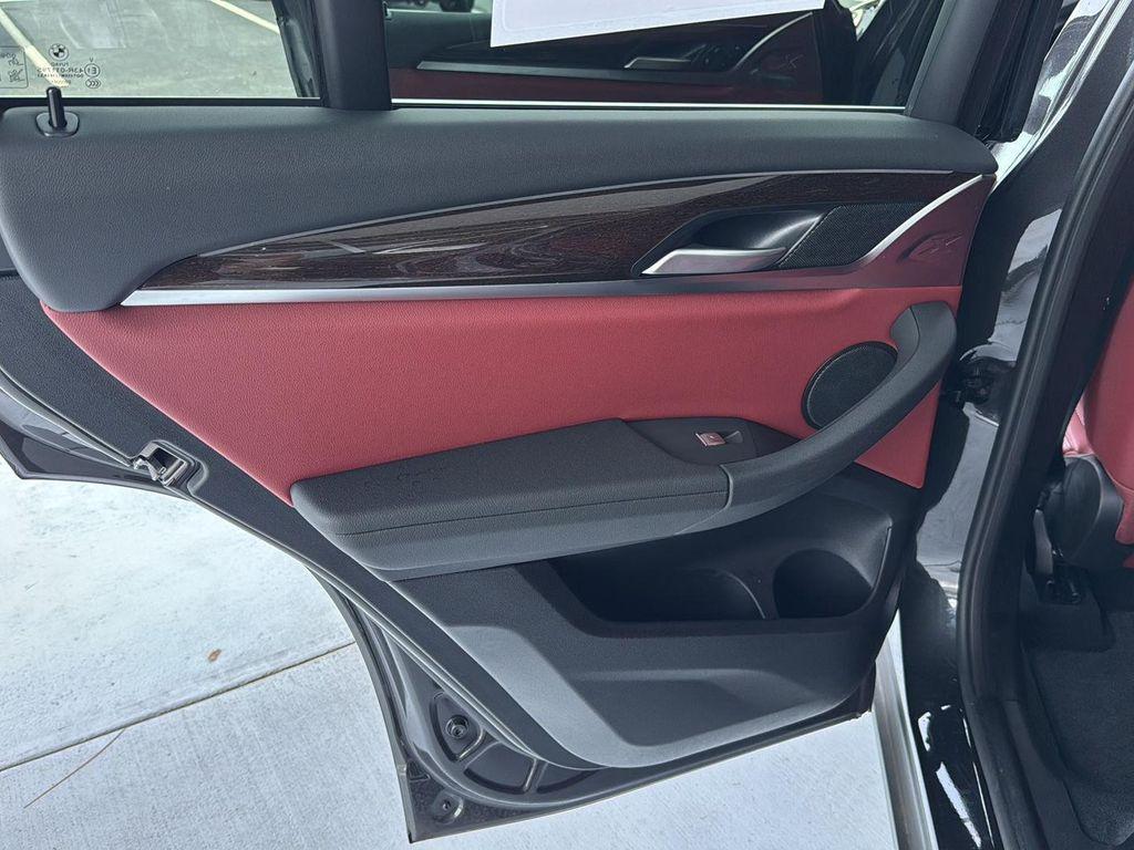used 2025 BMW X4 car, priced at $51,900