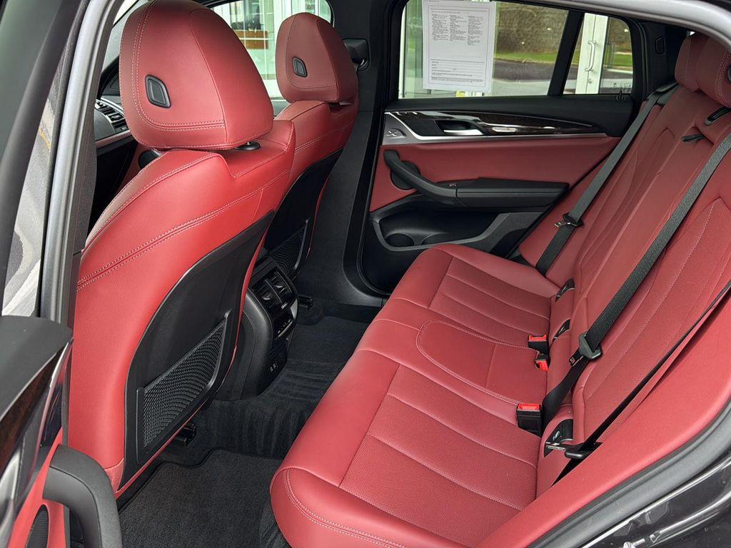 used 2025 BMW X4 car, priced at $51,900