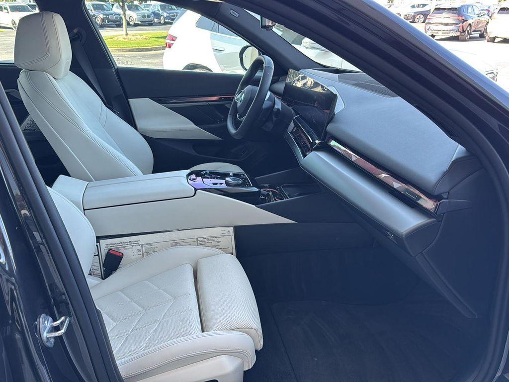 used 2024 BMW i5 car, priced at $55,900