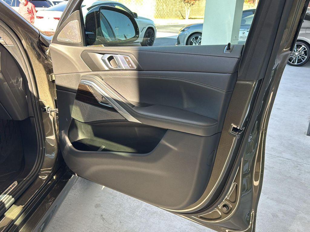 used 2024 BMW X6 car, priced at $66,706