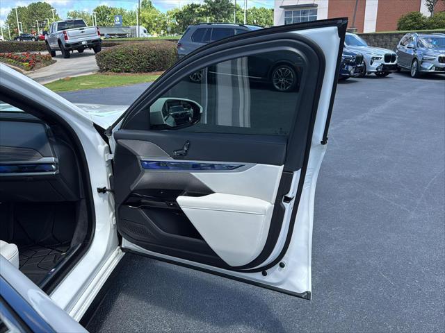 used 2025 BMW 740 car, priced at $97,900