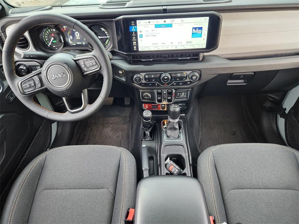 used 2024 Jeep Wrangler 4xe car, priced at $35,733