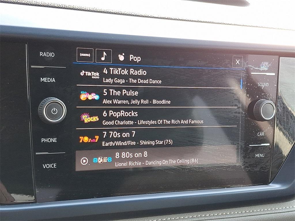 used 2024 Volkswagen Taos car, priced at $26,942