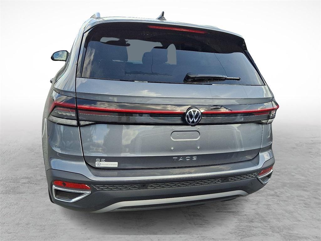 used 2025 Volkswagen Taos car, priced at $26,364