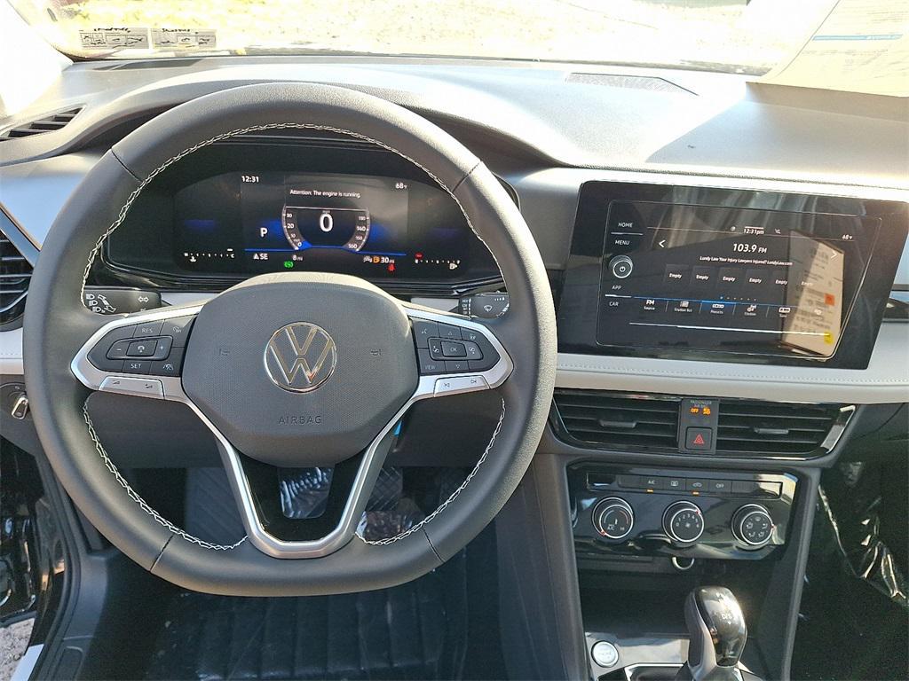 new 2025 Volkswagen Taos car, priced at $27,021