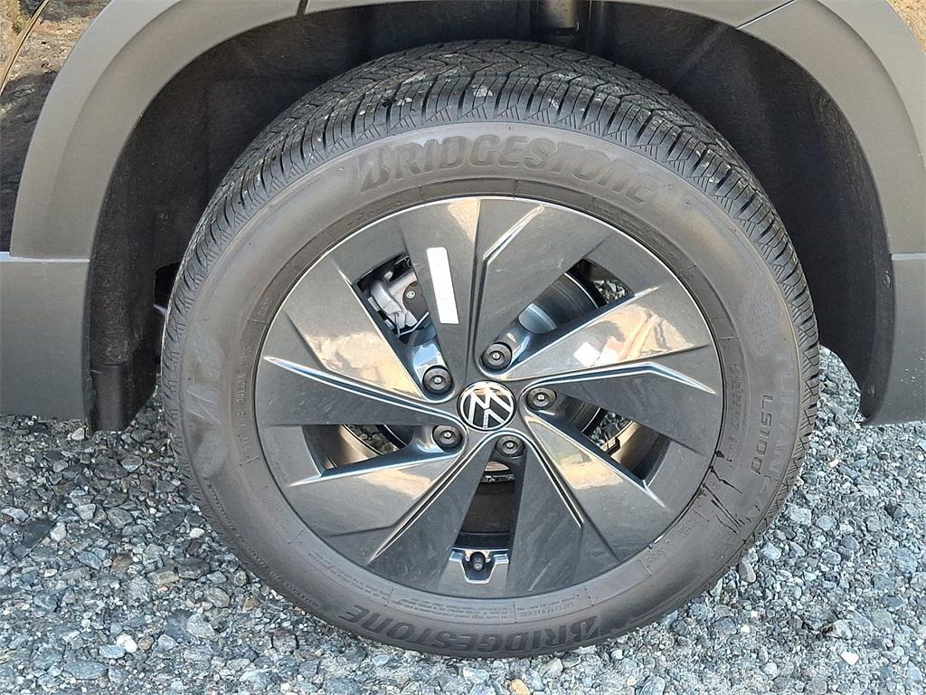 new 2025 Volkswagen Taos car, priced at $27,021