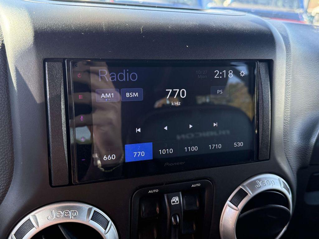 used 2016 Jeep Wrangler Unlimited car, priced at $22,995