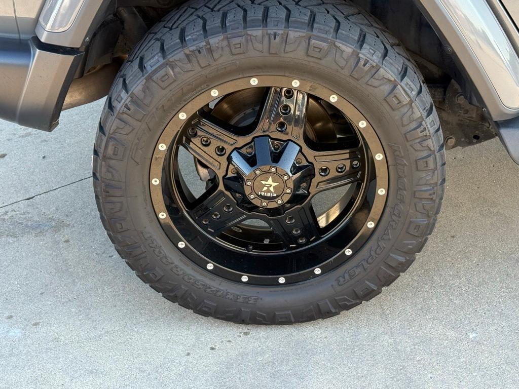 used 2018 Jeep Wrangler Unlimited car, priced at $27,933