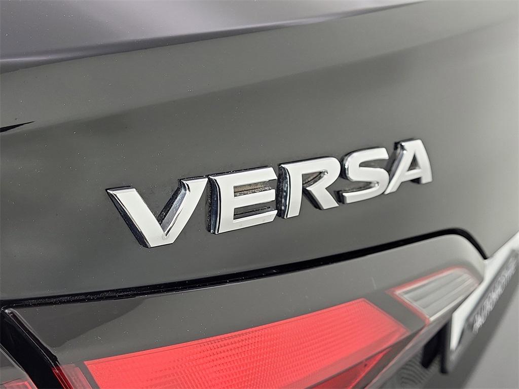 used 2021 Nissan Versa car, priced at $14,000