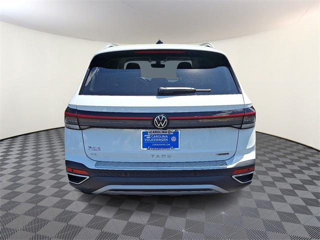 new 2025 Volkswagen Taos car, priced at $30,213