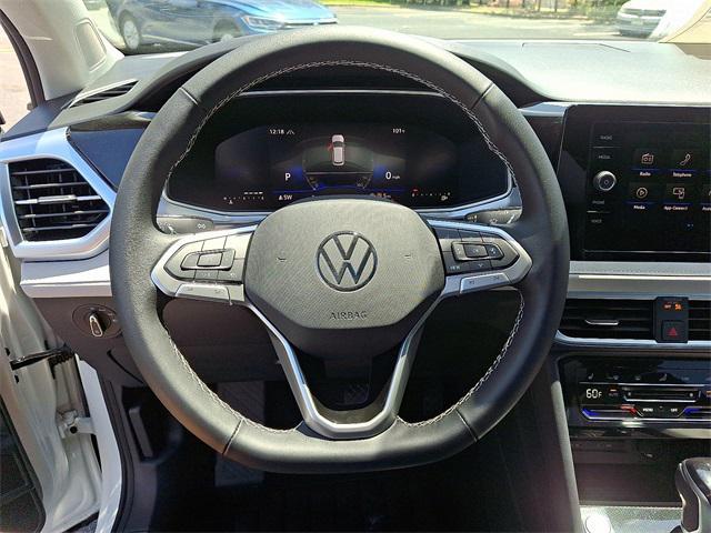 new 2025 Volkswagen Taos car, priced at $30,213