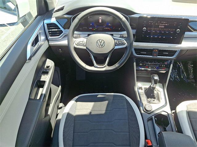 new 2025 Volkswagen Taos car, priced at $30,213