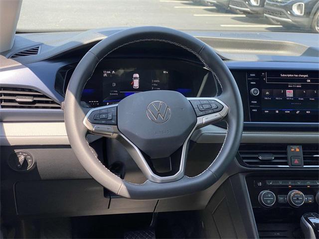 used 2024 Volkswagen Taos car, priced at $24,998