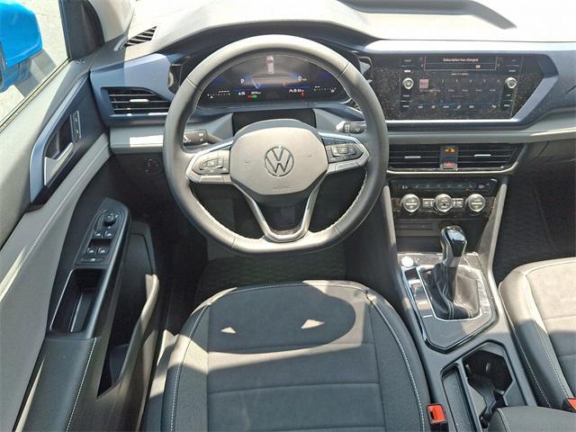 used 2024 Volkswagen Taos car, priced at $25,188