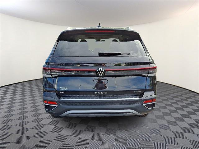 new 2025 Volkswagen Taos car, priced at $30,306