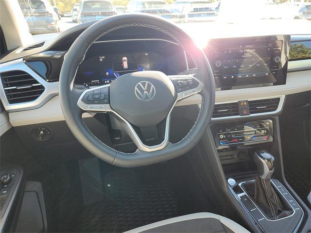 new 2025 Volkswagen Taos car, priced at $29,016